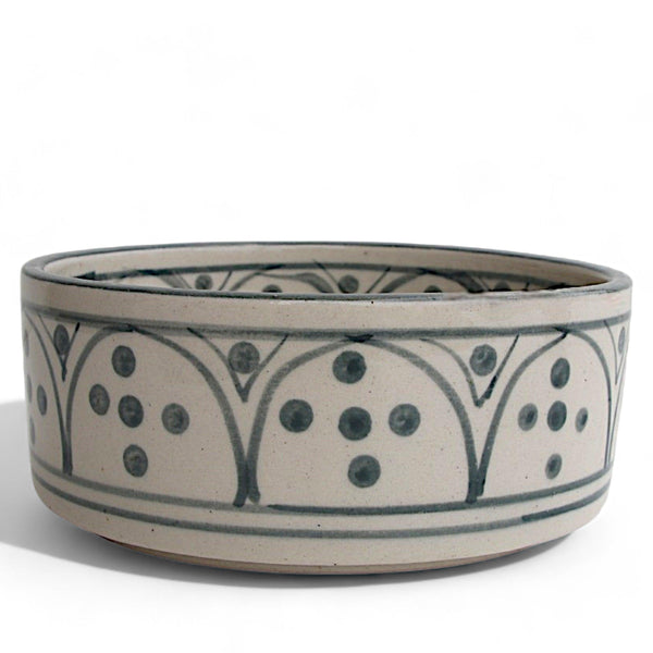 Display image of Hand-painted ceramic bowl with intricate grey patterns on a white matte surface.