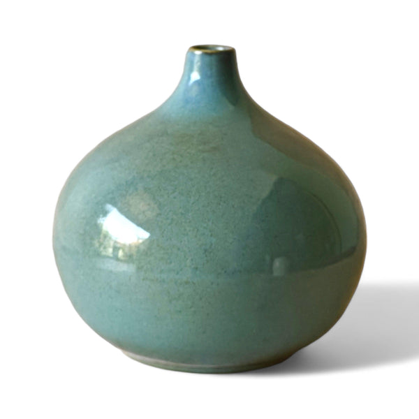 Display image of sea green ceramic vase with a round bulbous shape and narrow neck.