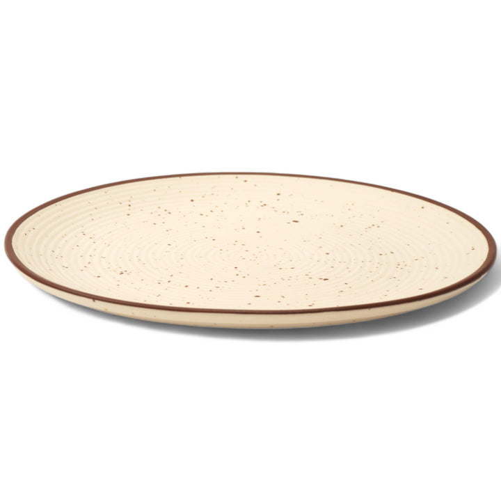 Display image of Whispering Sands: Ivory & Caramel Dusk Dinner Plate – Elegant ceramic dinner plate in ivory and caramel hues, featuring a non-slip base, microwave and dishwasher safe, crafted from lead-free and cadmium-free materials for safe, stylish dining