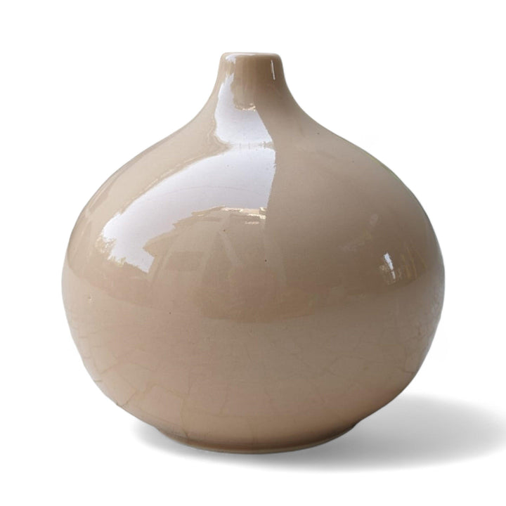 Display image of cream color ceramic vase with a round bulbous shape and narrow neck.