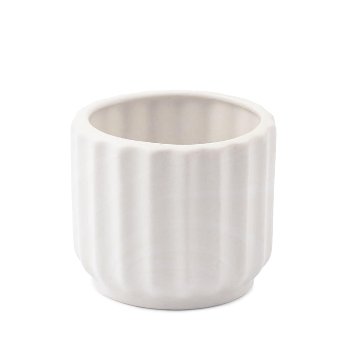 Display image of chalk white ceramic planter with a ribbed texture and glossy finish.