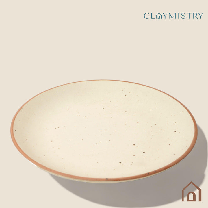 Display image of Whispering Sands: Ivory & Caramel Dusk Dinner Plate – Elegant ceramic dinner plate in ivory and caramel hues, featuring a non-slip base, microwave and dishwasher safe, crafted from lead-free and cadmium-free materials for safe, stylish dining.