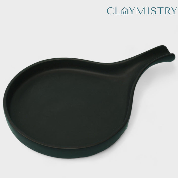 Display image of Black ceramic Streamline Platter featuring minimalist design for modern table settings; perfect for serving appetizers, desserts, or main courses. Crafted from high-quality, durable ceramic, this elegant platter is microwave and dishwasher safe, non-toxic, and includes a non-slip base for added safety and convenience. Ideal for both casual meals and special occasions.