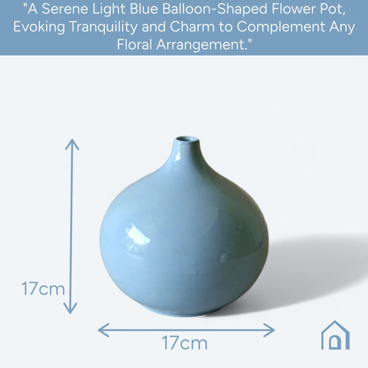 Display image of light blue ceramic vase with a round bulbous shape and narrow neck.