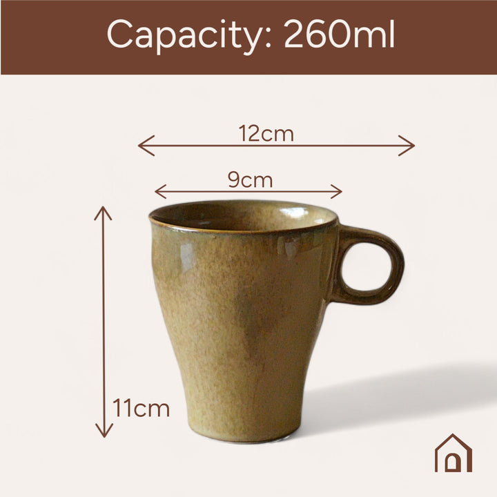 Display image of light brown ceramic coffee mug with a glossy finish and ergonomic handle.