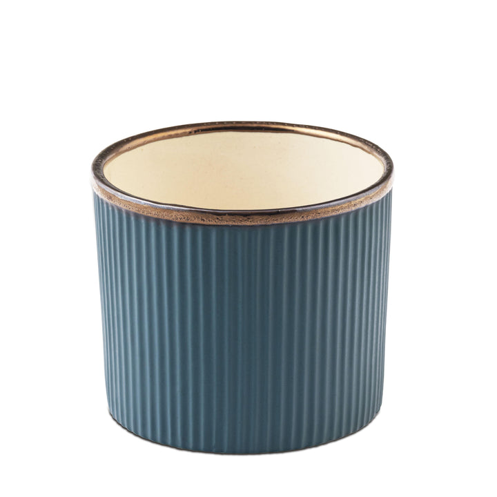 Display image of deep sea green  ceramic planter with a ribbed texture and brown rim, featuring a matte finish.