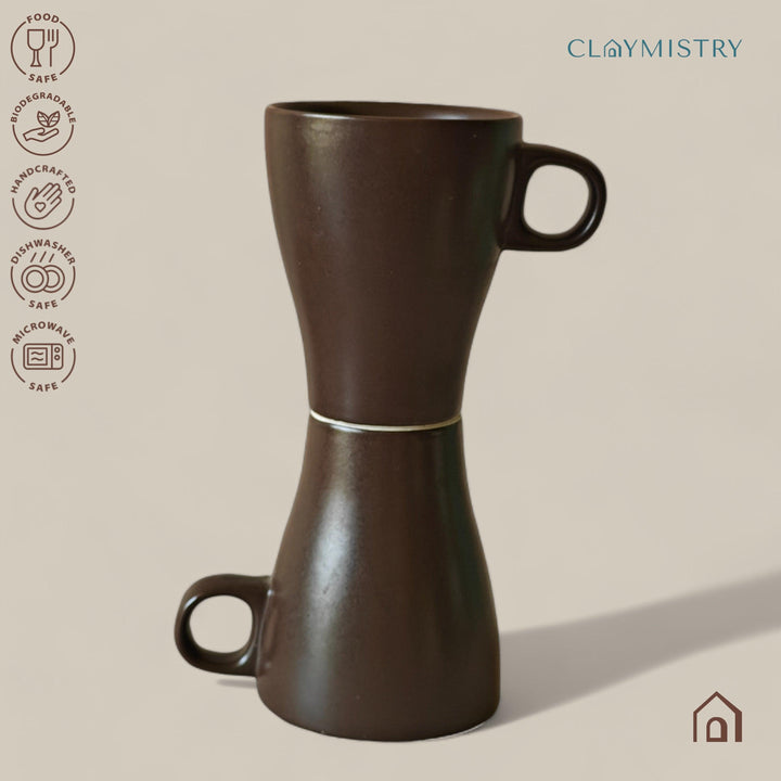 Display image of brown ceramic coffee mug with a glossy finish and ergonomic handle.