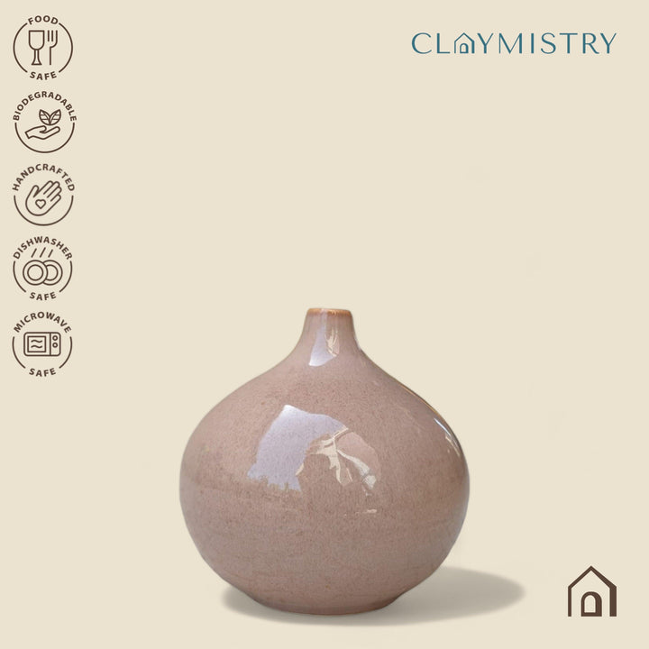 Display image of coffe color ceramic vase with a round bulbous shape and narrow neck.