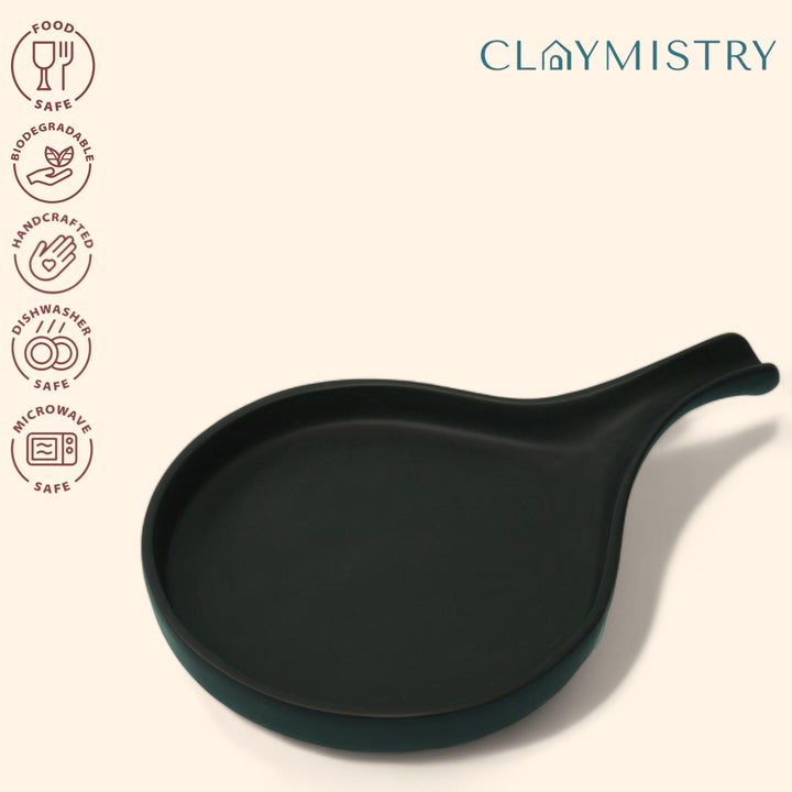 Display image of Black ceramic Streamline Platter featuring minimalist design for modern table settings; perfect for serving appetizers, desserts, or main courses. Crafted from high-quality, durable ceramic, this elegant platter is microwave and dishwasher safe, non-toxic, and includes a non-slip base for added safety and convenience. Ideal for both casual meals and special occasions.