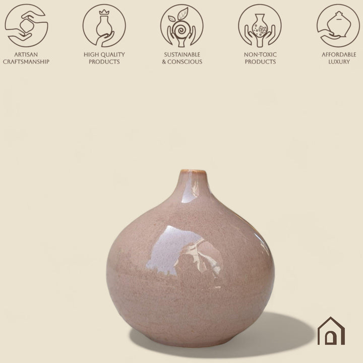 Display image of coffe color ceramic vase with a round bulbous shape and narrow neck.