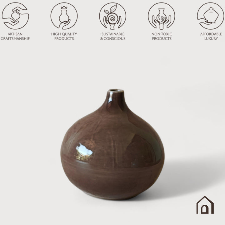 Display image of brown ceramic vase with a round bulbous shape and narrow neck.