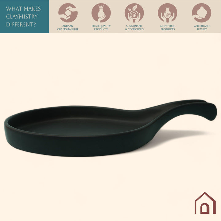 Display image of Black ceramic Streamline Platter featuring minimalist design for modern table settings; perfect for serving appetizers, desserts, or main courses. Crafted from high-quality, durable ceramic, this elegant platter is microwave and dishwasher safe, non-toxic, and includes a non-slip base for added safety and convenience. Ideal for both casual meals and special occasions.