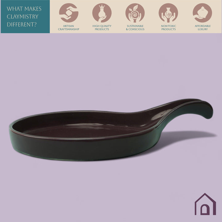 Display image of purple ceramic Streamline Platter featuring minimalist design for modern table settings; perfect for serving appetizers, desserts, or main courses. Crafted from high-quality, durable ceramic, this elegant platter is microwave and dishwasher safe, non-toxic, and includes a non-slip base for added safety and convenience. Ideal for both casual meals and special occasions.