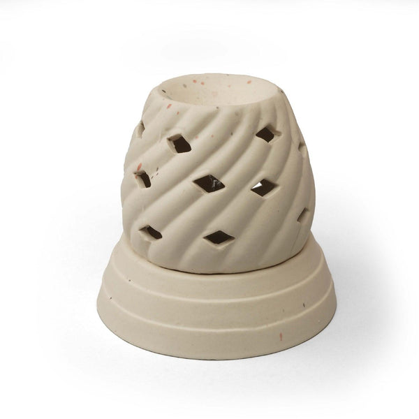 Display image of Rhombus Aroma Diffuser – Handmade ceramic aroma diffuser featuring a unique geometric rhombus design, high-quality construction, and soft lighting, perfect for diffusing essential oils to create a calming ambiance while enhancing your home decor with modern elegance.