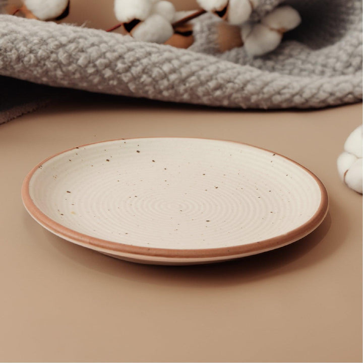 Display image of Whispering Sands: Ivory & Caramel Dusk Dinner Plate – Elegant ceramic dinner plate in ivory and caramel hues, featuring a non-slip base, microwave and dishwasher safe, crafted from lead-free and cadmium-free materials for safe, stylish dining