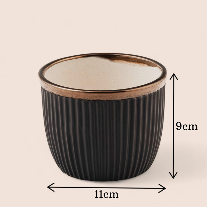 Display image of Handcrafted Top Trimmed ceramic planter with a ribbed texture in a black tone and a black rim, designed for indoor use.