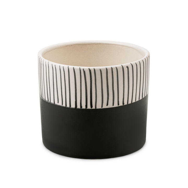 Display image of Black and white ceramic planter with vertical stripe detailing on the upper half and a smooth matte finish. 